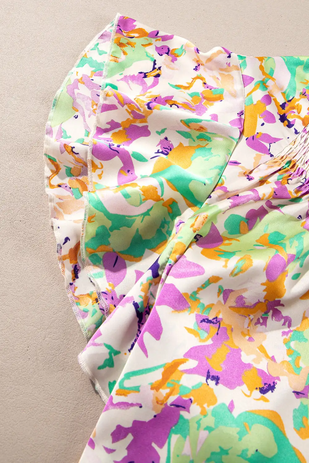 Abstract Print Ruffled Notched Neck Blouse