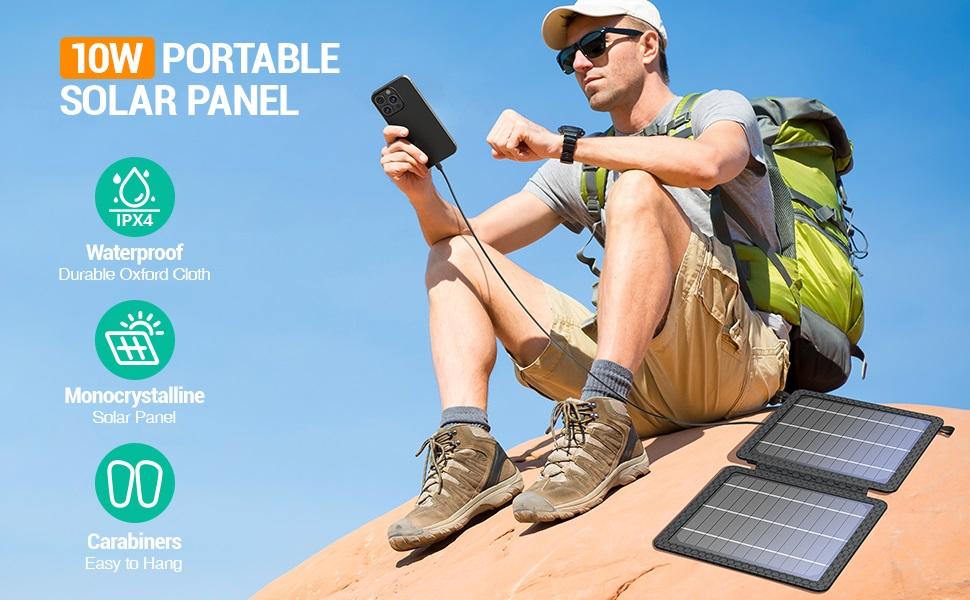 10W solar panel unfolded beside a hiker during an outdoor break