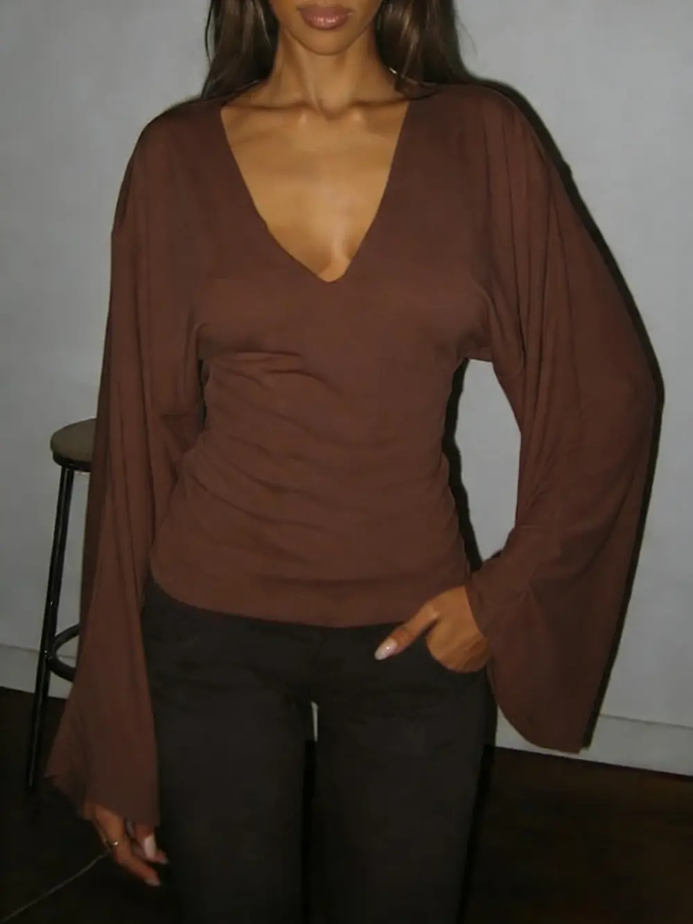 Elegant women's solid-color long-sleeved T-shirt, featuring a sexy deep V-neck and a slim-fit design
