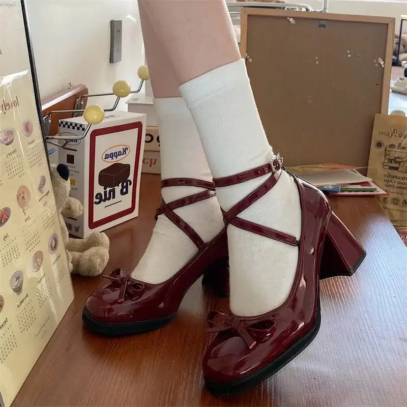 Bow-Detail Mary-Jane Round-Toe Pumps