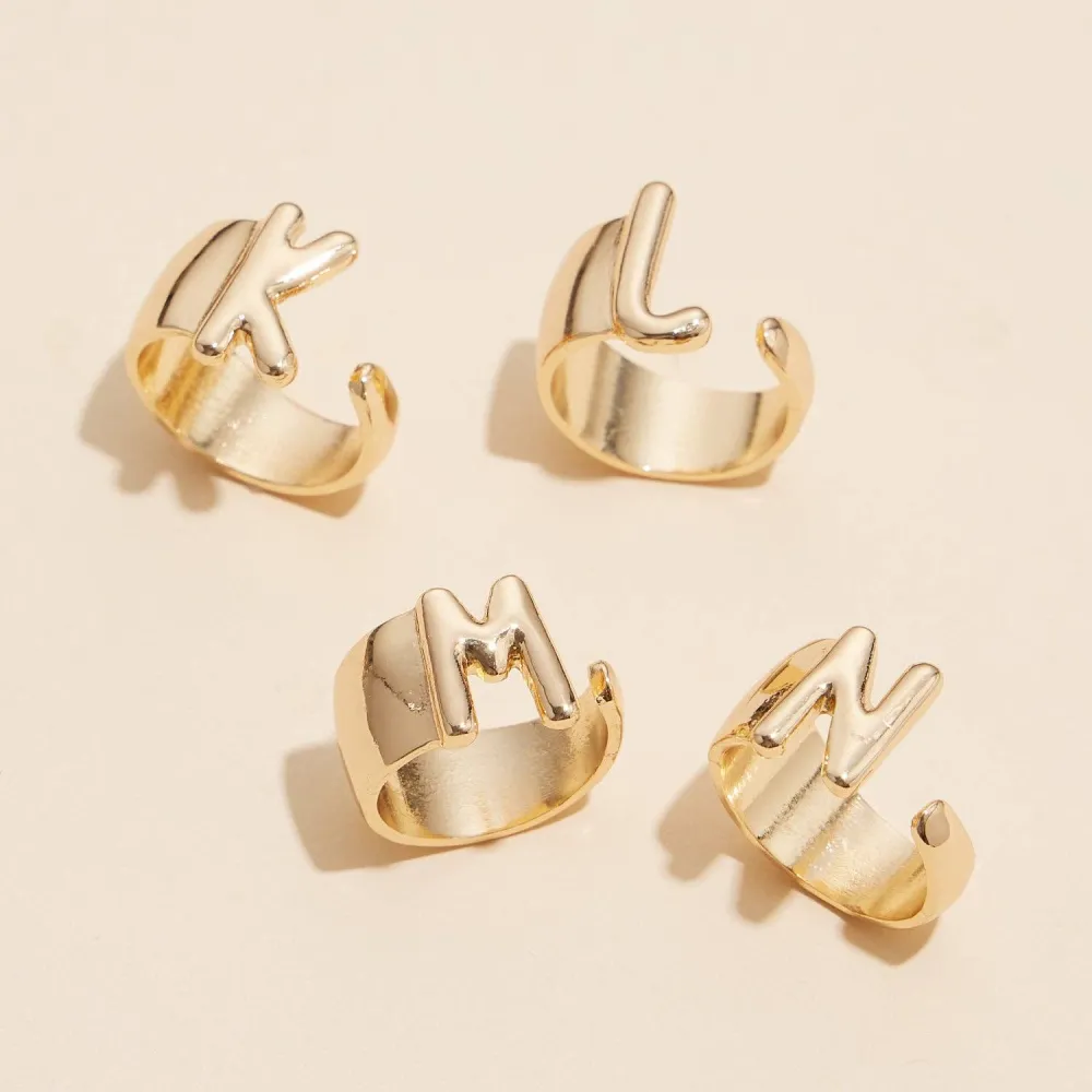 Raised Initial Statement Ring