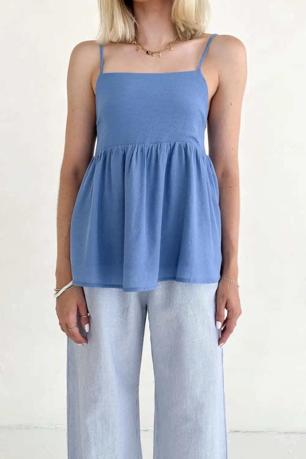 Quiet Detail Soft Peplum Top