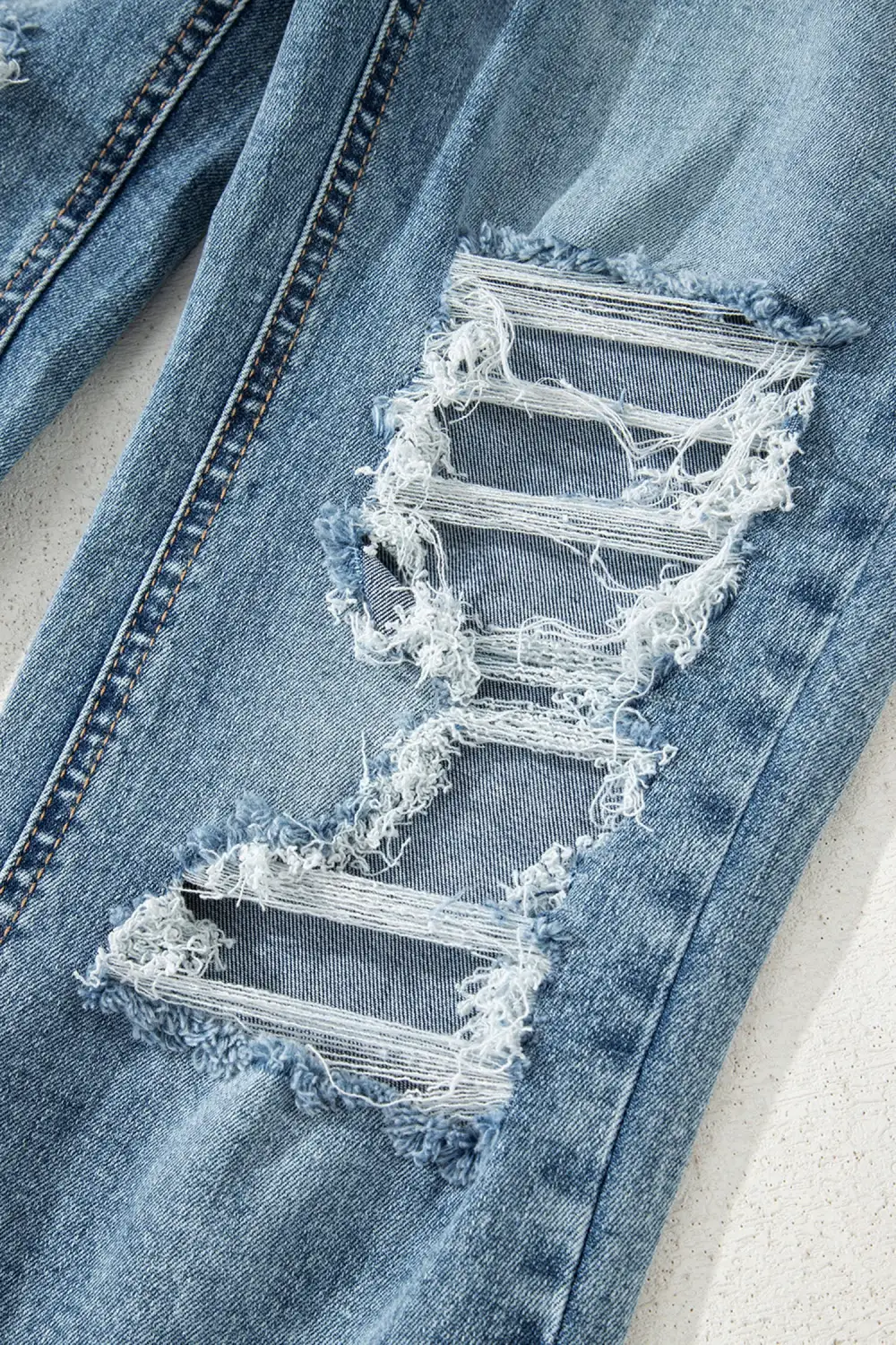 Raw Hem Ripped Open Knee Fit Flare Jeans