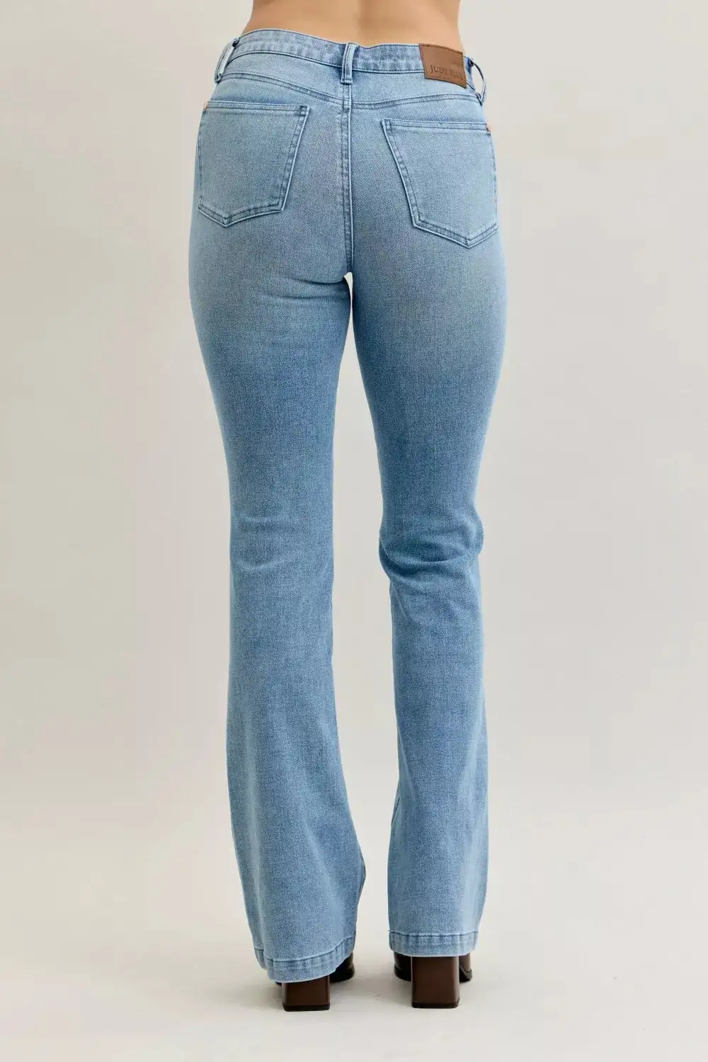 Tailored Mid Rise Flare Leg Pocketed Denim Jeans
