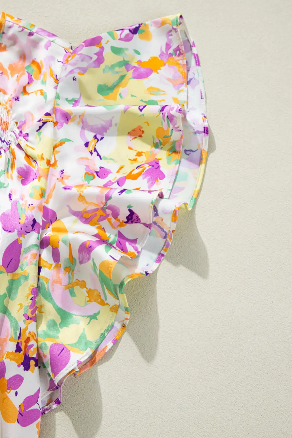 Abstract Print Ruffled Notched Neck Blouse