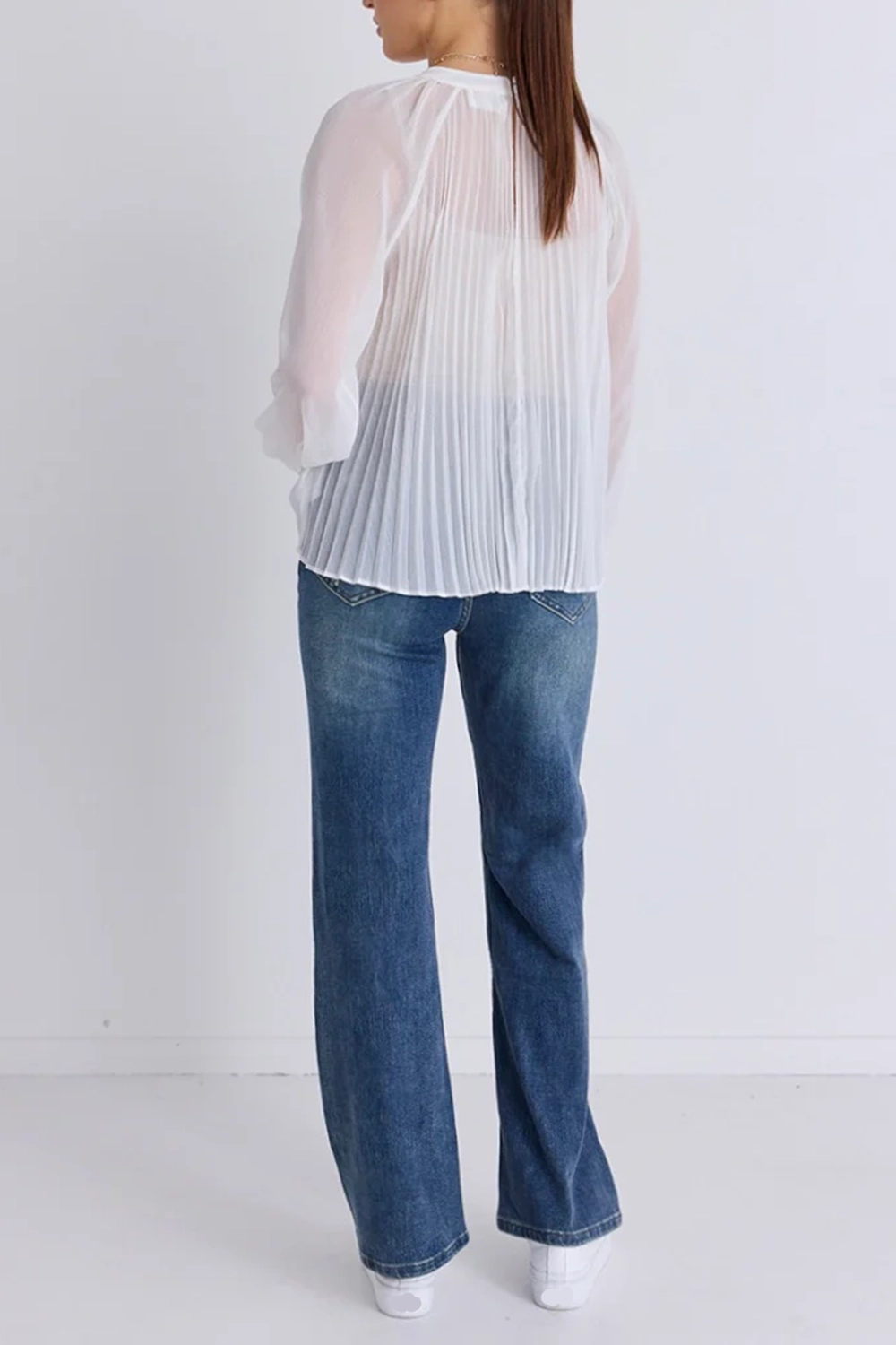 White Sheer Top Paired Jeans