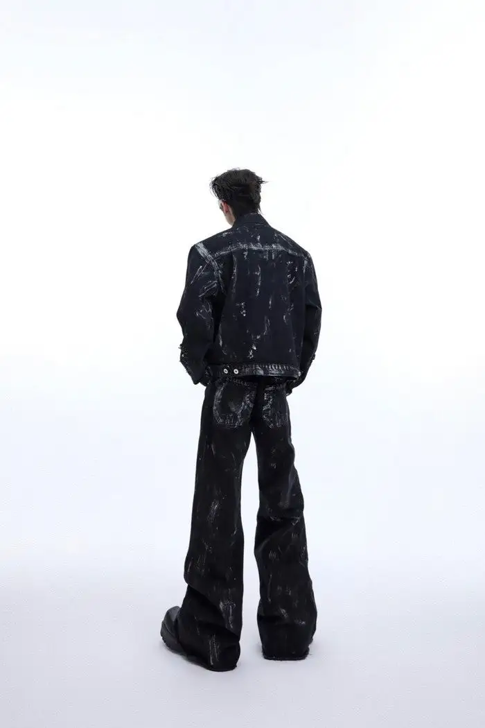 Distressed Jeans With Metal Rivets