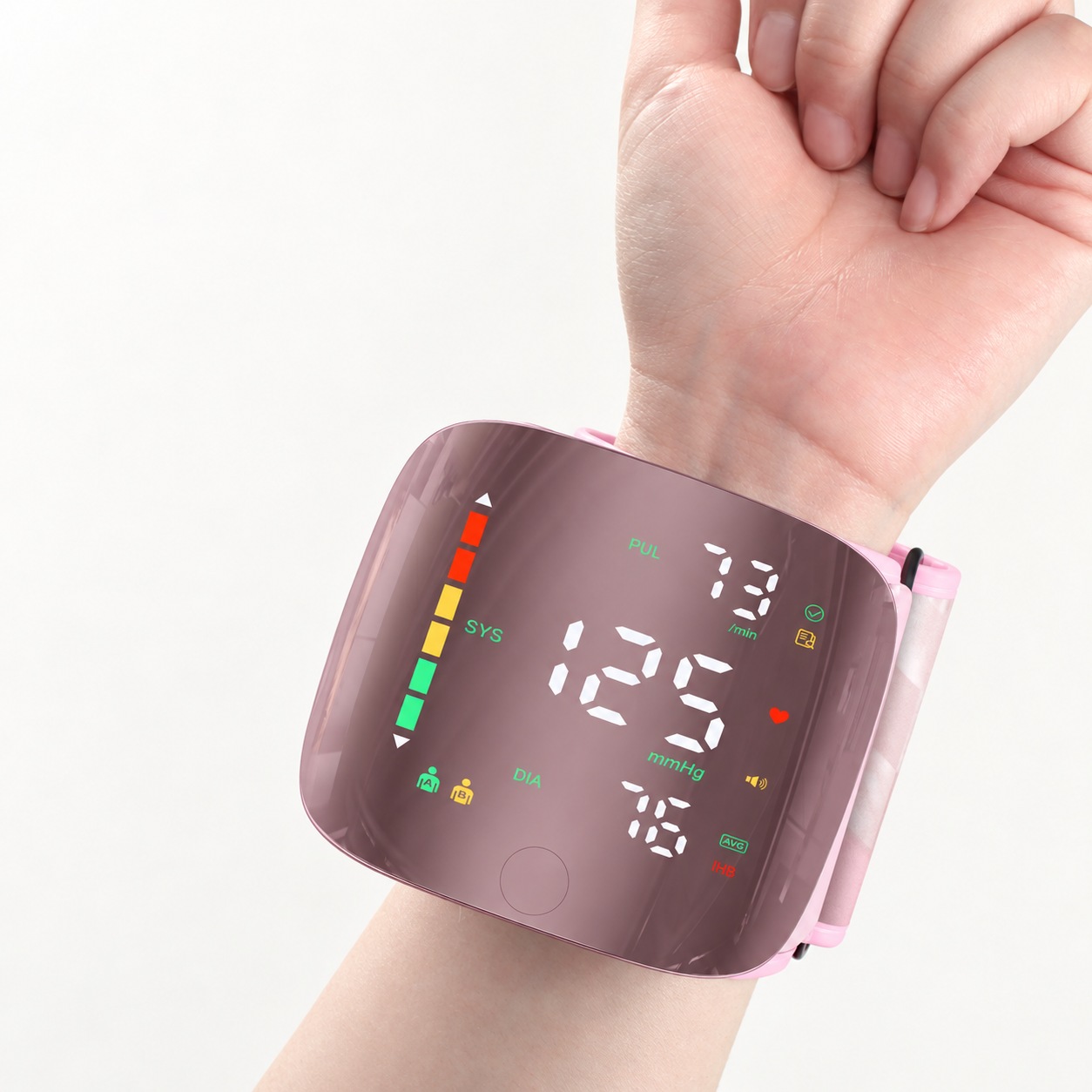 Close-up of the pink monitor and adjustable cuff worn on a bare wrist
