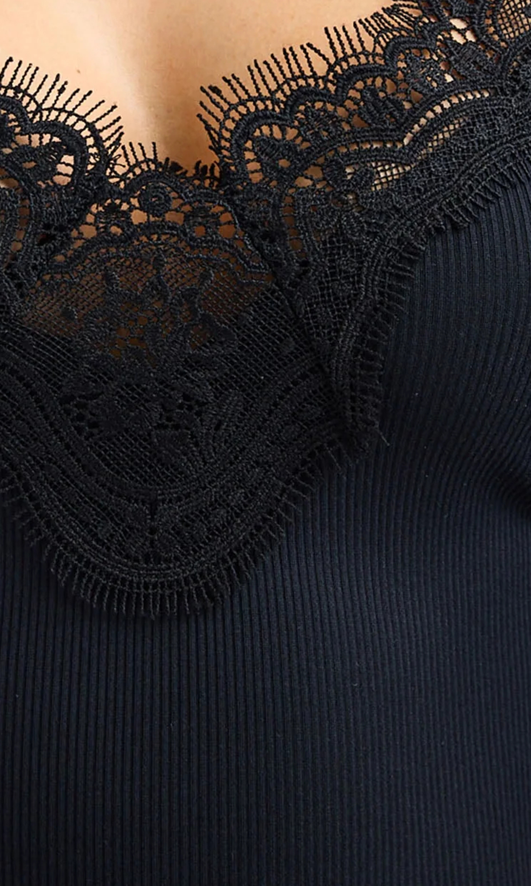 Black Vest With Lace Neck Line And Cross Black