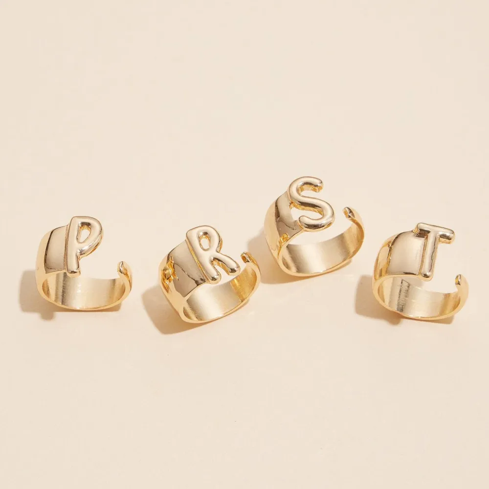 Raised Initial Statement Ring