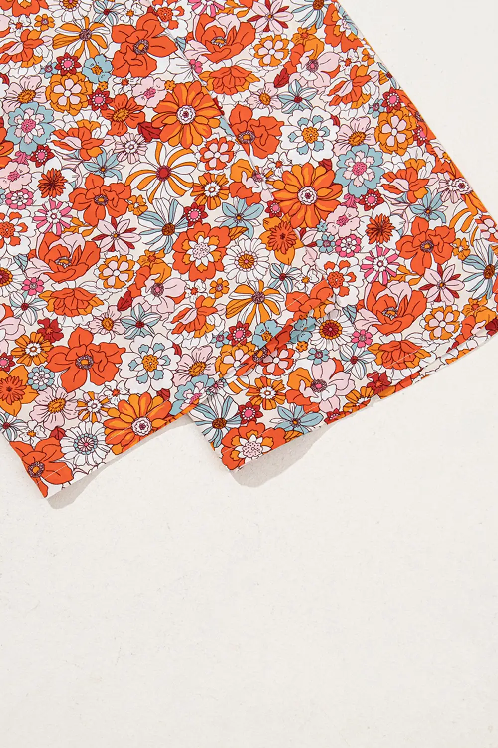 Floral Print Sleeveless Smocked Shift Jumpsuit