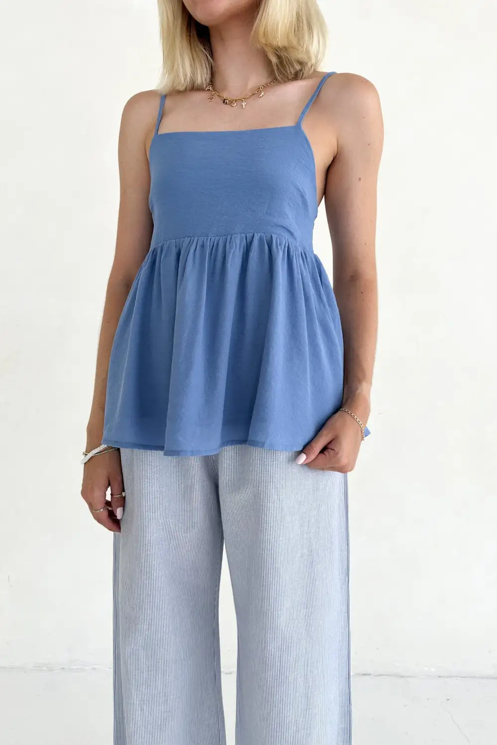 Quiet Detail Soft Peplum Top