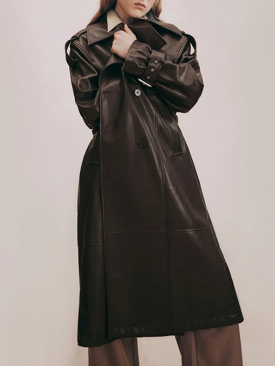 A Long Elegant Brown Trench Coat With A Large Lapel