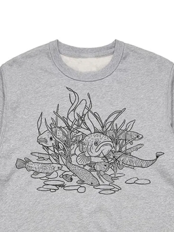A versatile sports shirt featuring a simple pattern of freshwater fishs