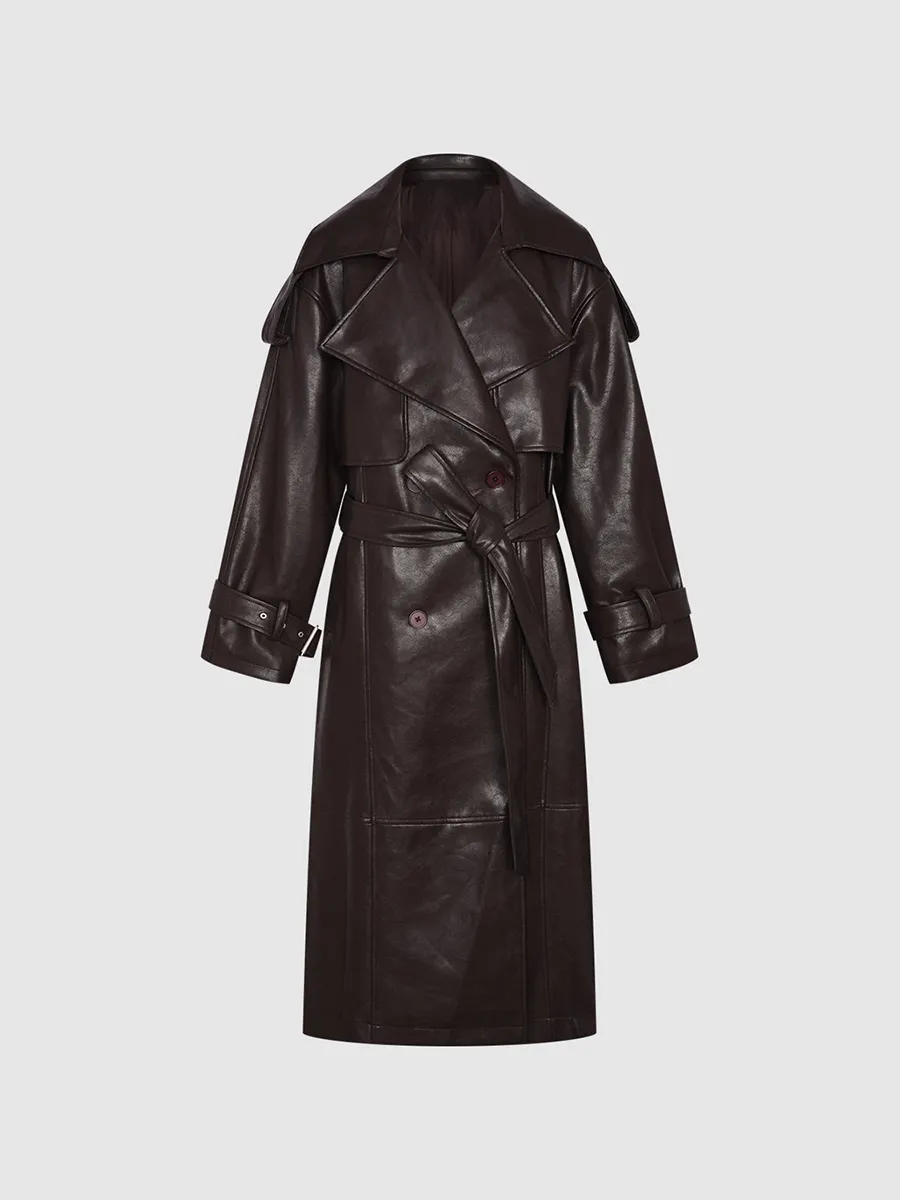 A Long Elegant Brown Trench Coat With A Large Lapel