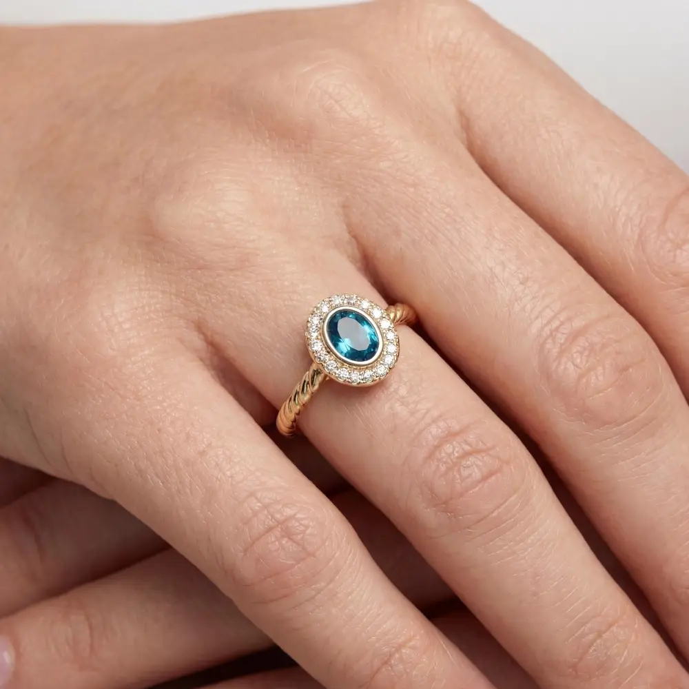 Simulated Turquoise Oval Halo Ring
