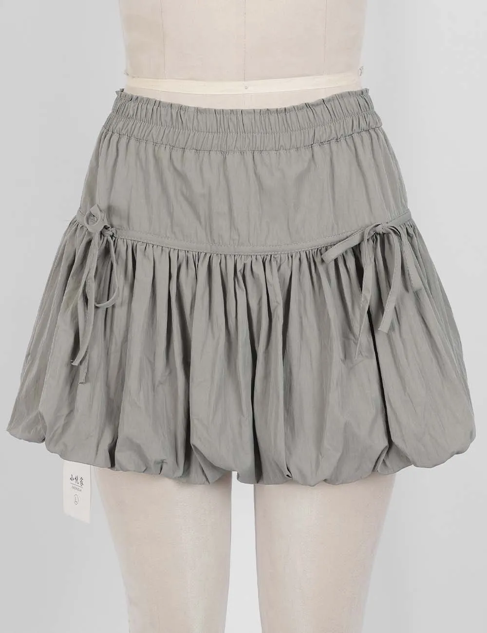 Solid Color Bubble Hem Bow Elastic Waist Mini Skirt