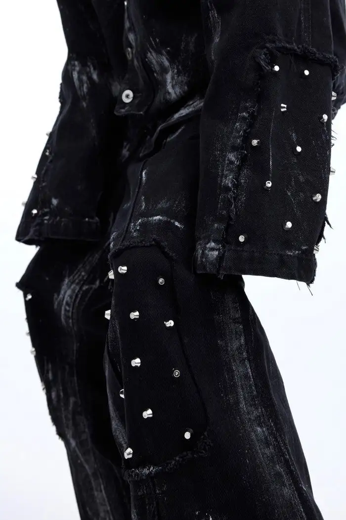 Distressed Jeans With Metal Rivets