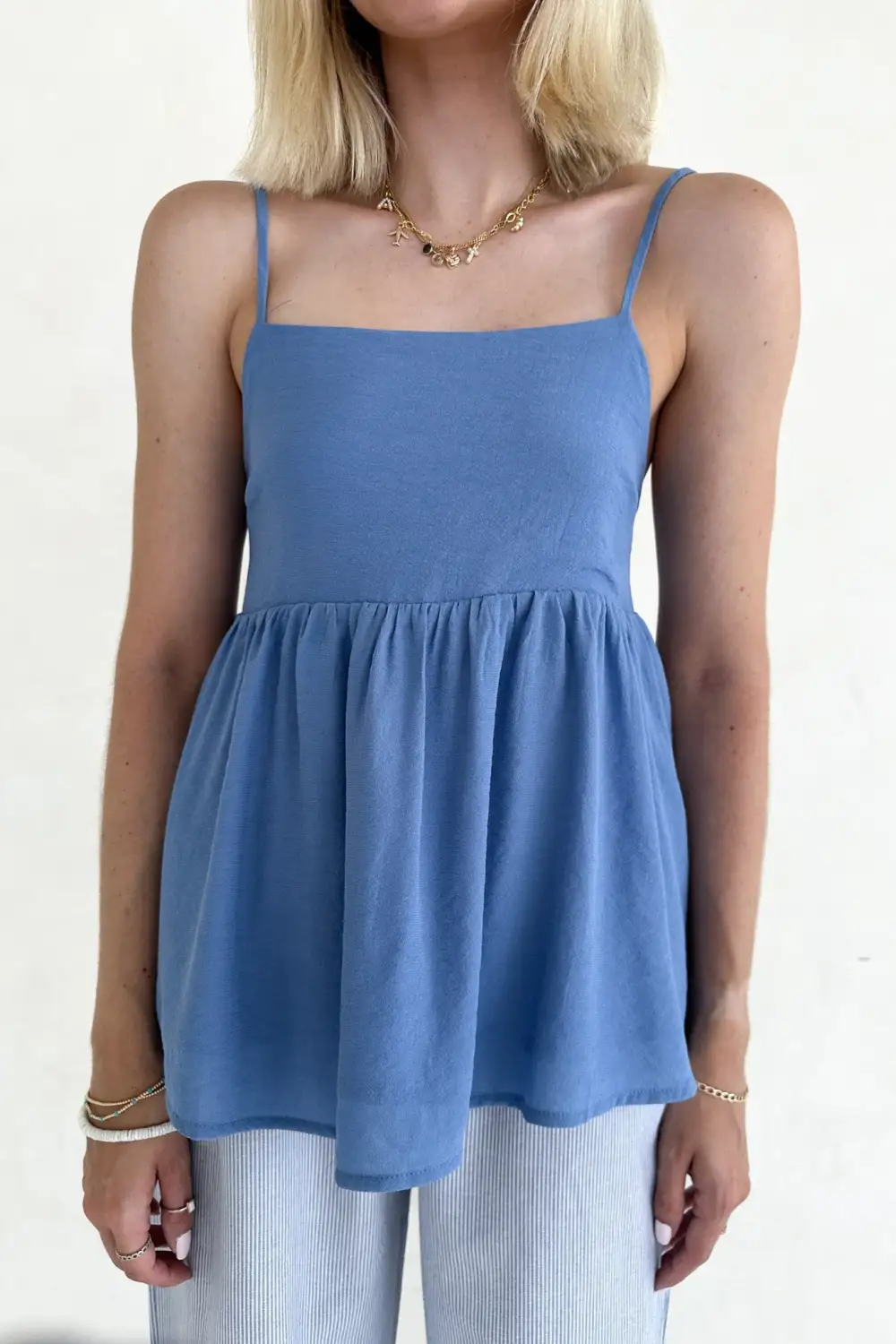 Quiet Detail Soft Peplum Top