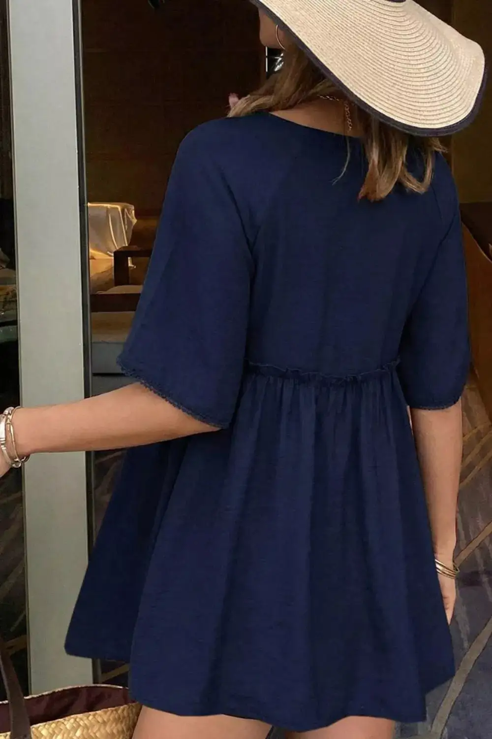 Ruffle Hem Tie Neck Blouse