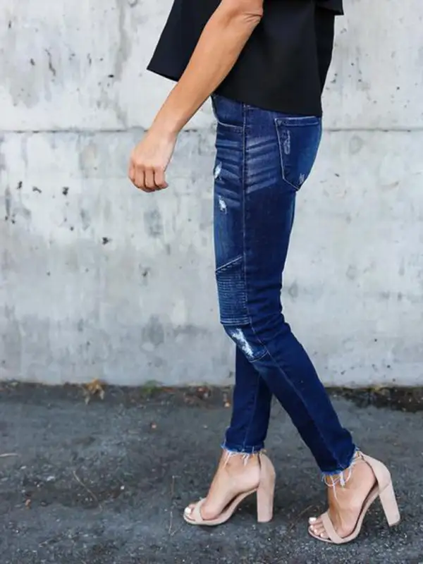 Distressed Stretch Pleated Denim Jeans