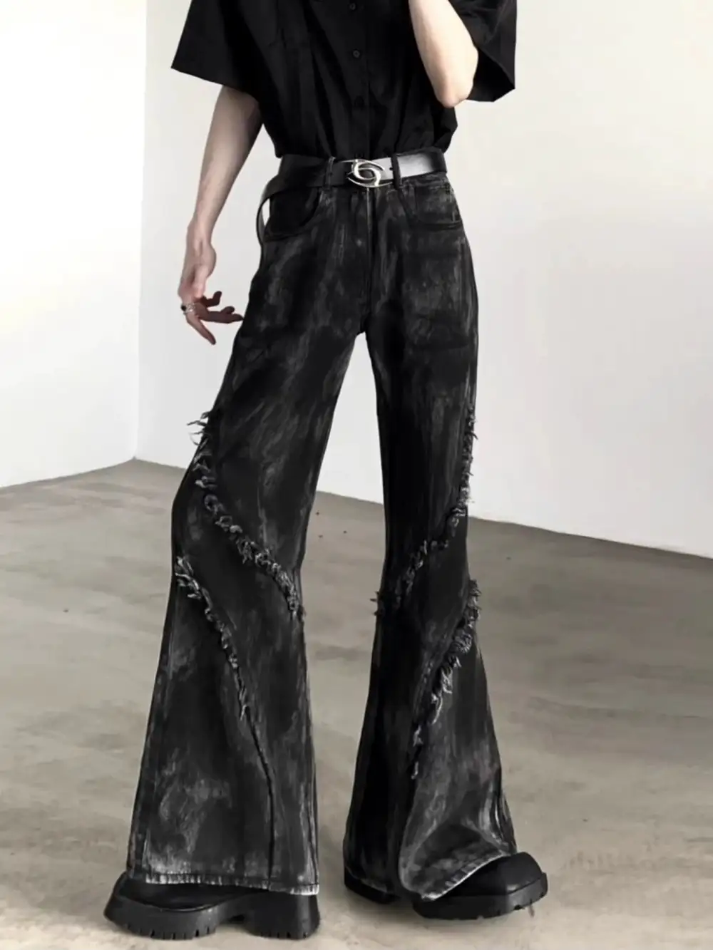 Distressed Flared Jeans With Frayed Seams