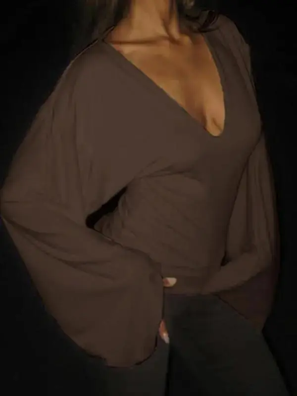 Elegant women's solid-color long-sleeved T-shirt, featuring a sexy deep V-neck and a slim-fit design