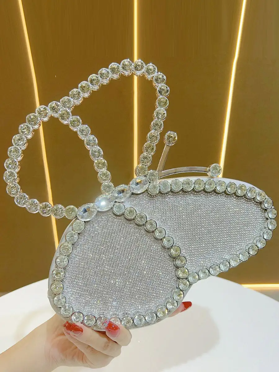 Asymmetric Bow Rhinestone Zip Clutch Bag