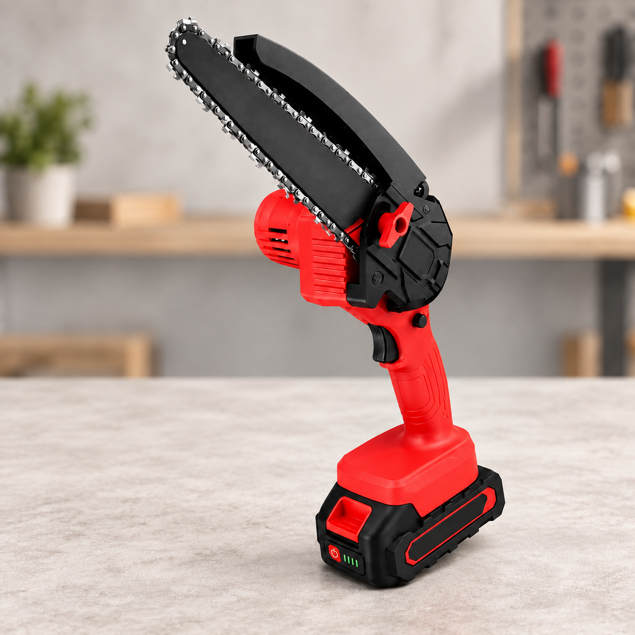 Red and black cordless mini chainsaw with one battery attached