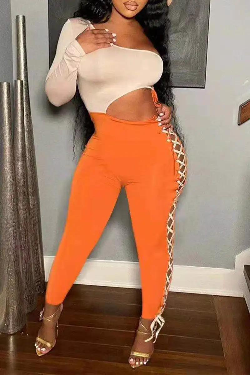 Fashion Sexy Patchwork Bandage Hollowed Out Oblique Collar Skinny Jumpsuits