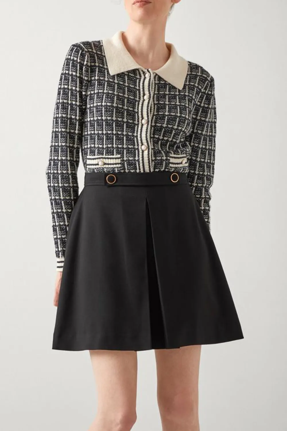 Black Pleated Mini Skirt with Metal Accents