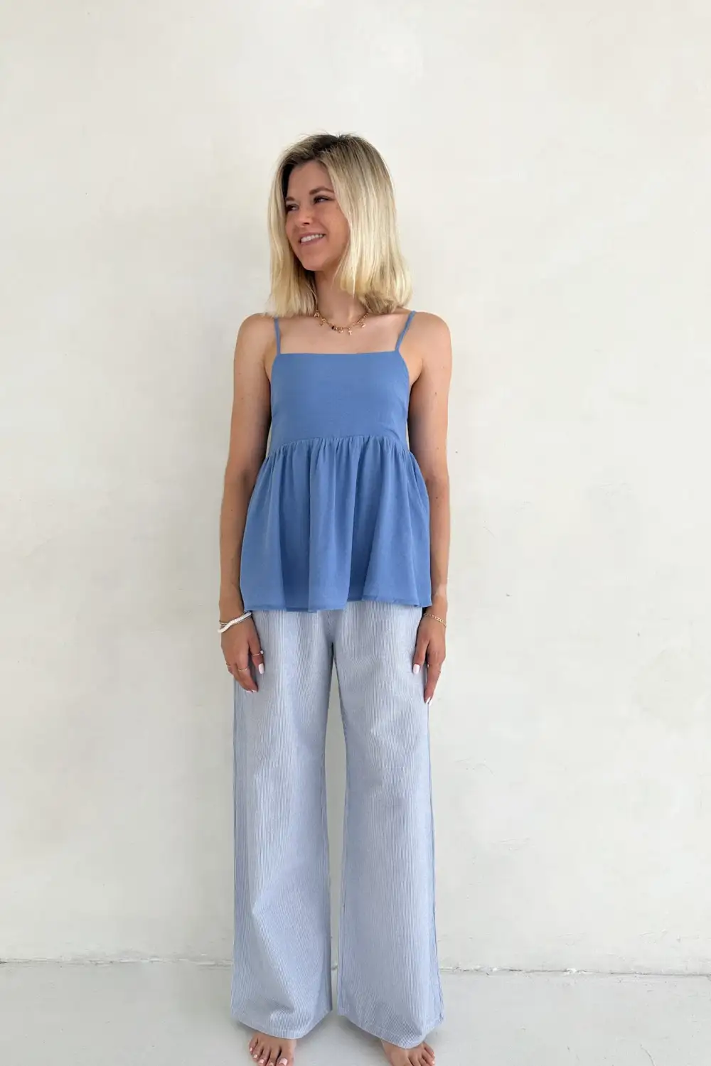 Quiet Detail Soft Peplum Top