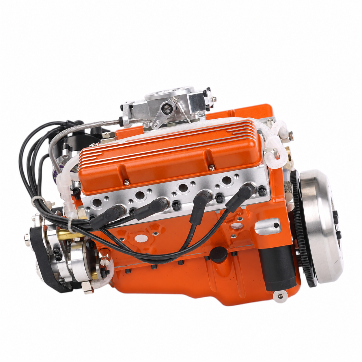 Side view: ignition leads, linkage, hoses and exposed mechanical components.