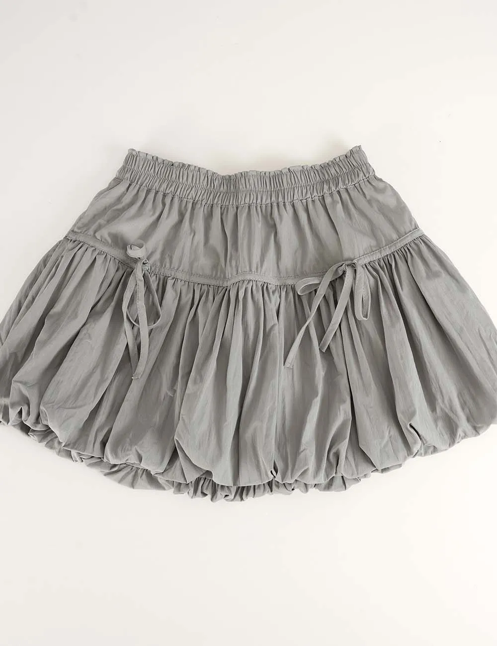 Solid Color Bubble Hem Bow Elastic Waist Mini Skirt