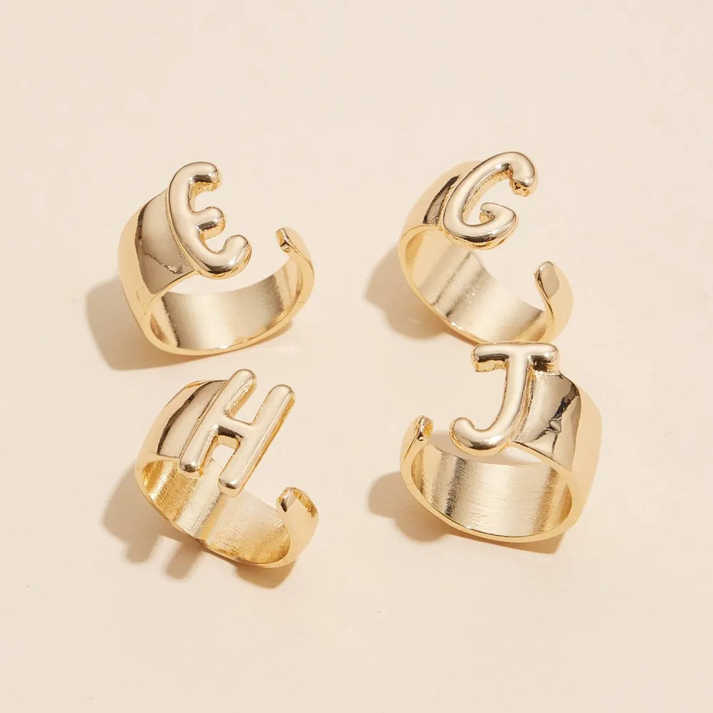 Raised Initial Statement Ring