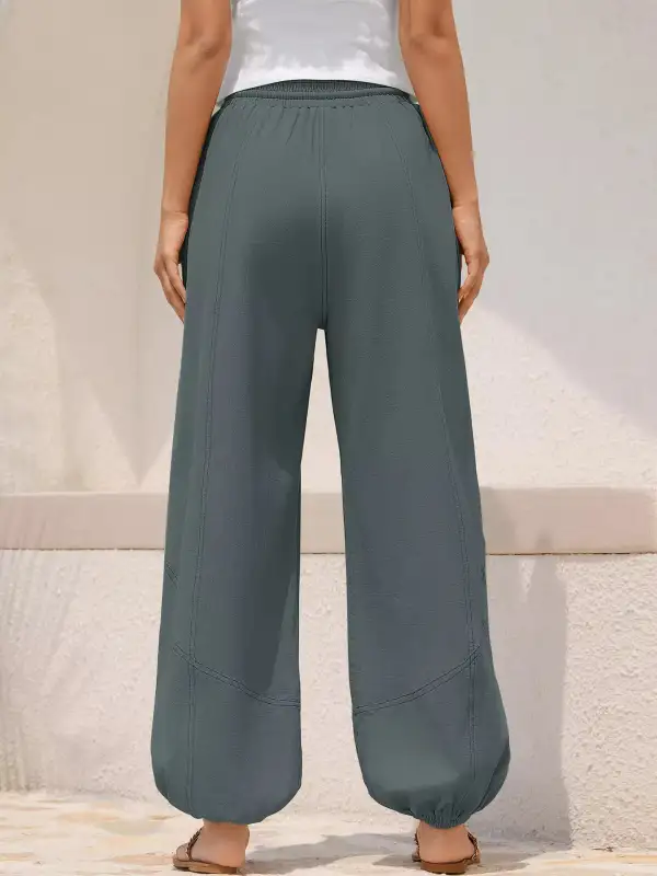 Relaxed-Fit Drawstring Pocketed Exposed-Seam Jogger Pants