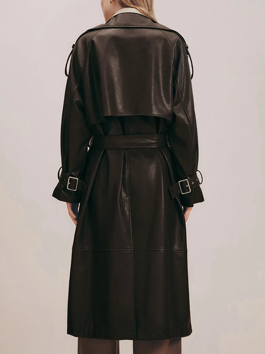 A Long Elegant Brown Trench Coat With A Large Lapel