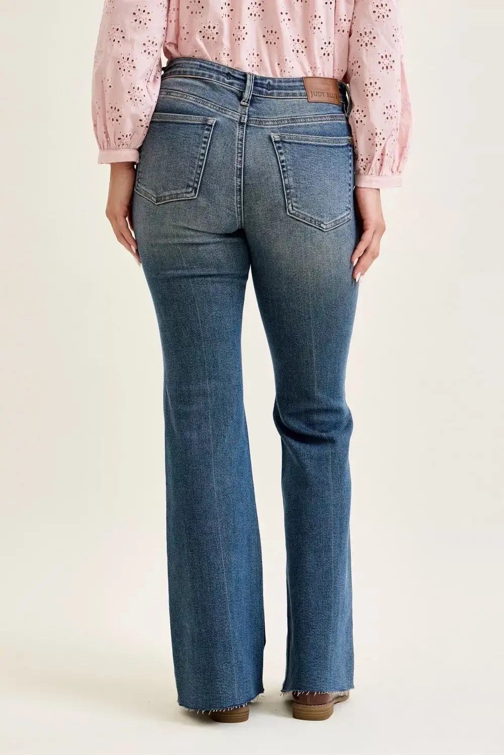 Mid Rise Flare Leg Pocketed Denim Jeans