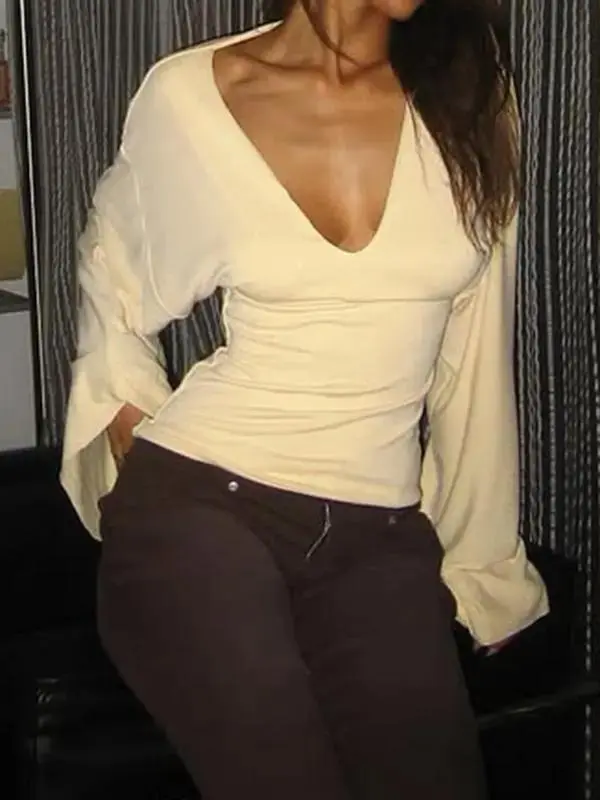 Elegant women's solid-color long-sleeved T-shirt, featuring a sexy deep V-neck and a slim-fit design