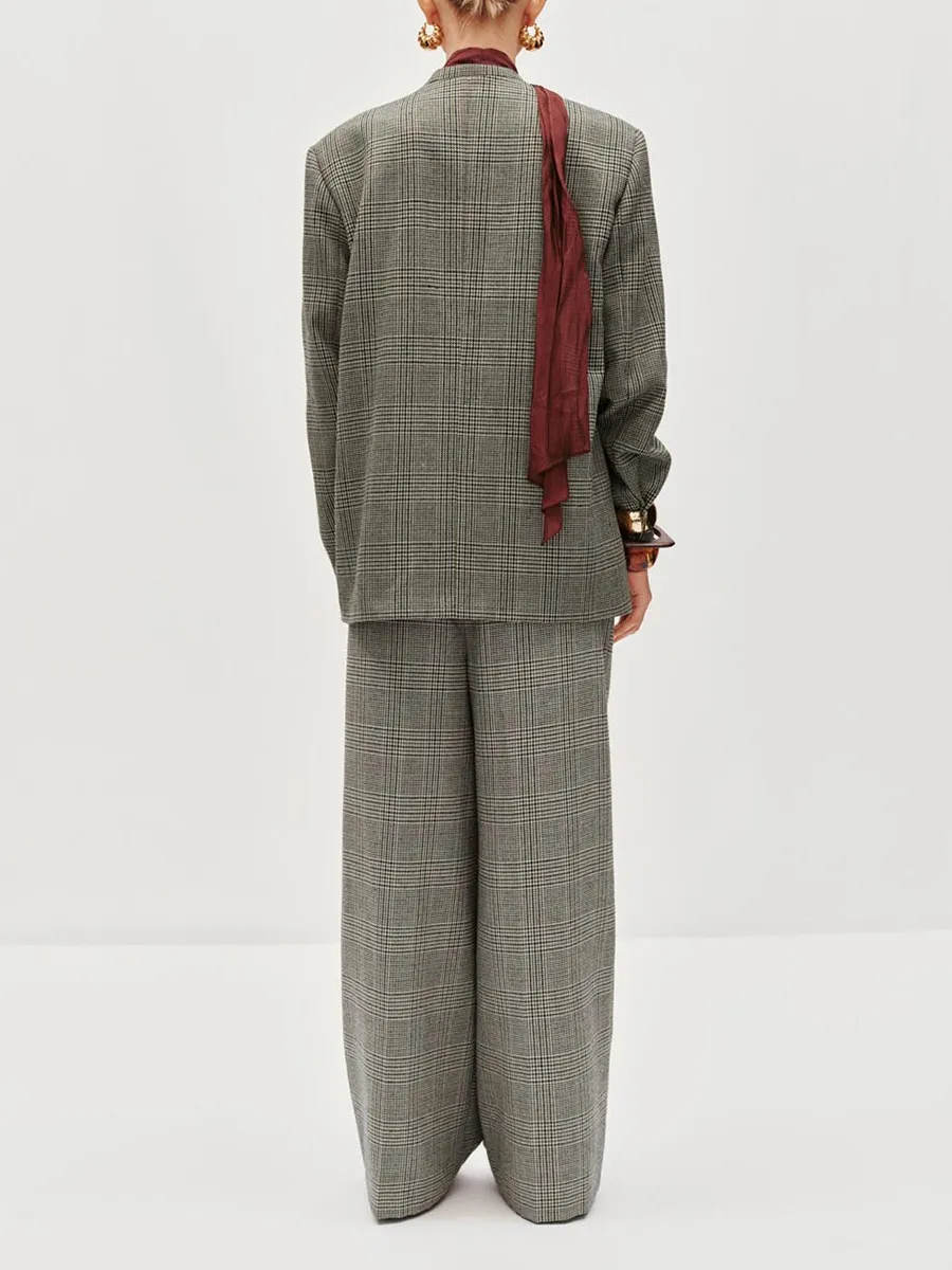 A Long Loose Coat In A British Style With A Checkered Suit For Women