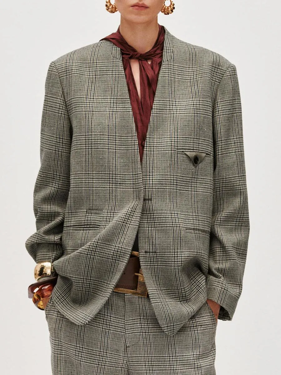 A Long Loose Coat In A British Style With A Checkered Suit For Women