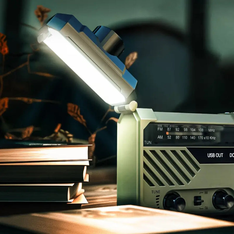 Folding LED lamp illuminating an open book