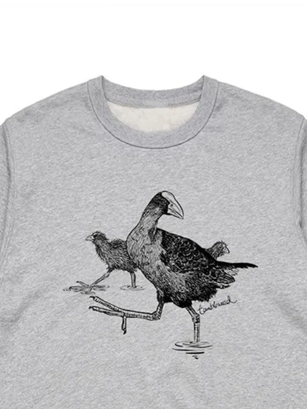 A versatile sports shirt with a simple purple waterfowl pattern