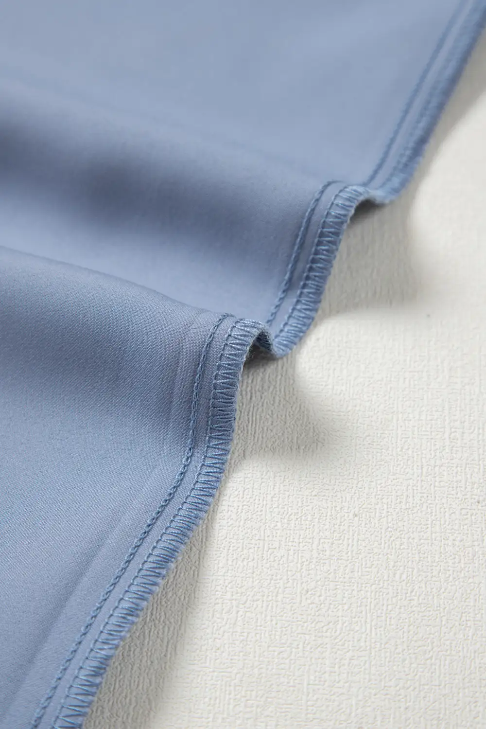 Pleated Asymmetric Hem Blouse