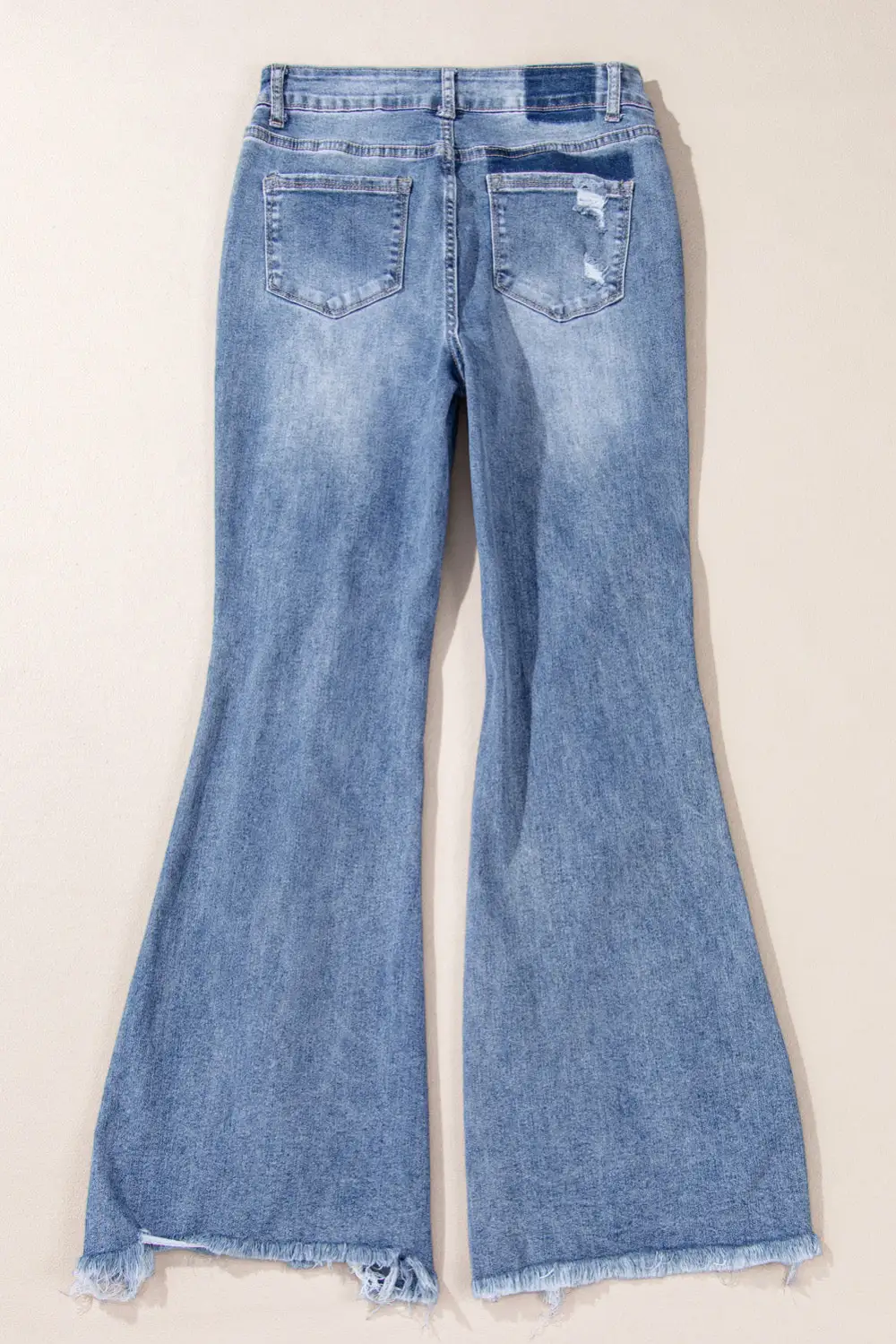 High Rise Ripped Distressed Hem Flared Jeans