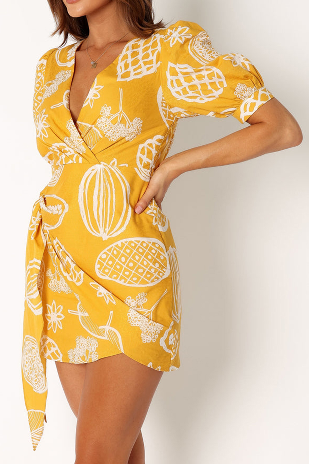 YELLOW PRINTED PATTERN WRAP MINI DRESS