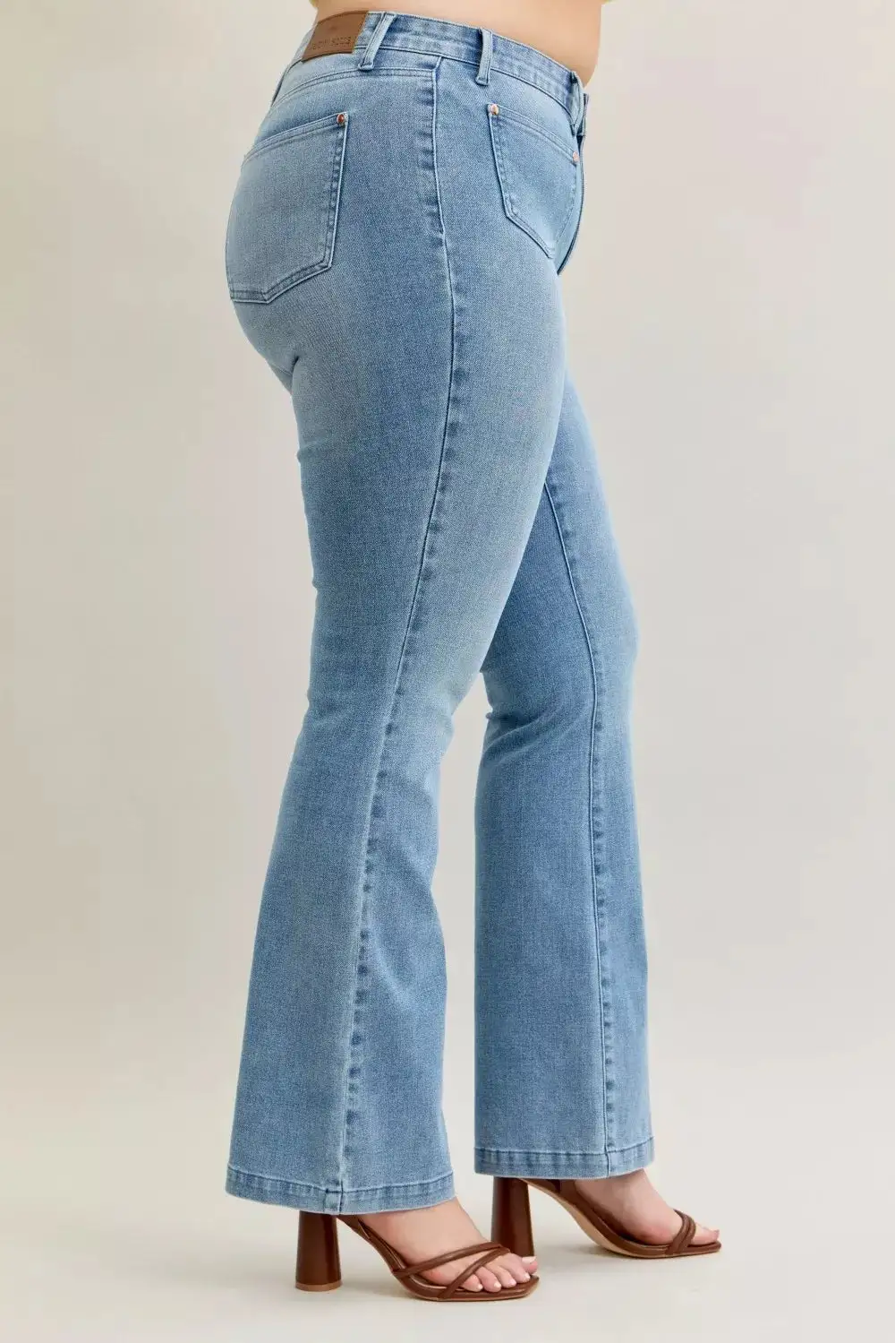 Tailored Mid Rise Flare Leg Pocketed Denim Jeans