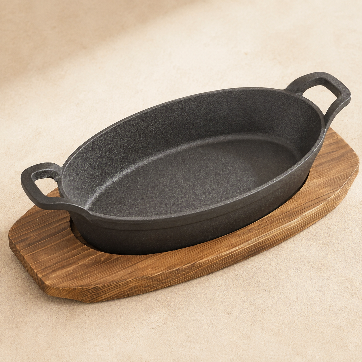 Close view of cast iron texture and the matching wood tray