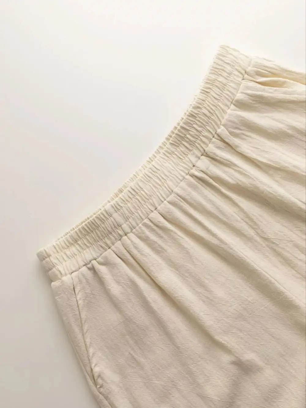 Sleeveless Ruffle Hem Top and Wide Leg Pants Two