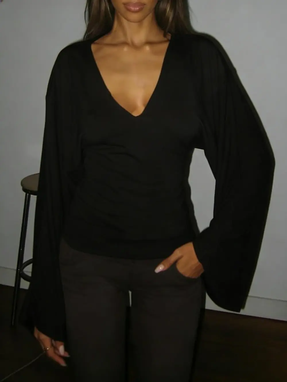 Elegant women's solid-color long-sleeved T-shirt, featuring a sexy deep V-neck and a slim-fit design